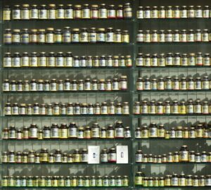 assorted labeled bottle on display shelf